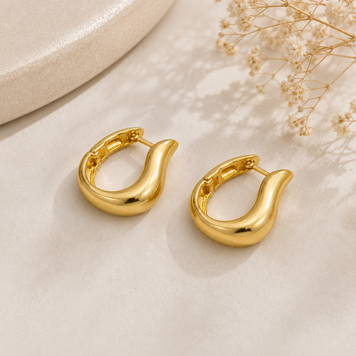 Brinco Argola Gota Torcida MontClair Ouro 18k