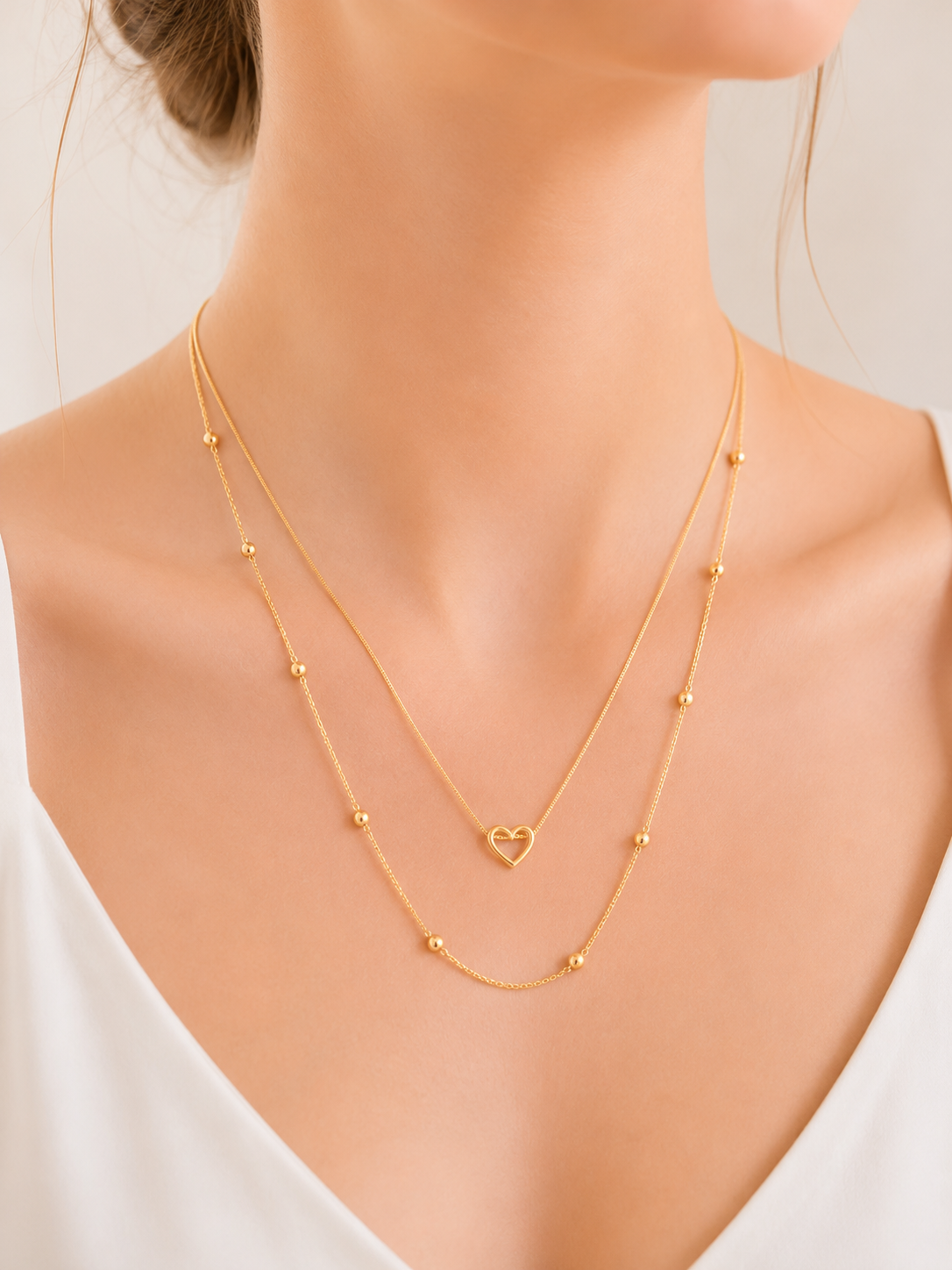 Colar Duplo Coração Vazado com Esferas MontClair Ouro 18k